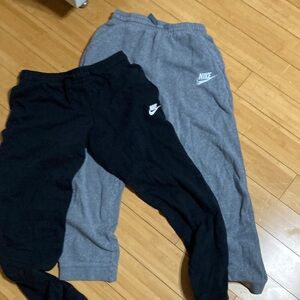 Two pair of Nike sweat pants